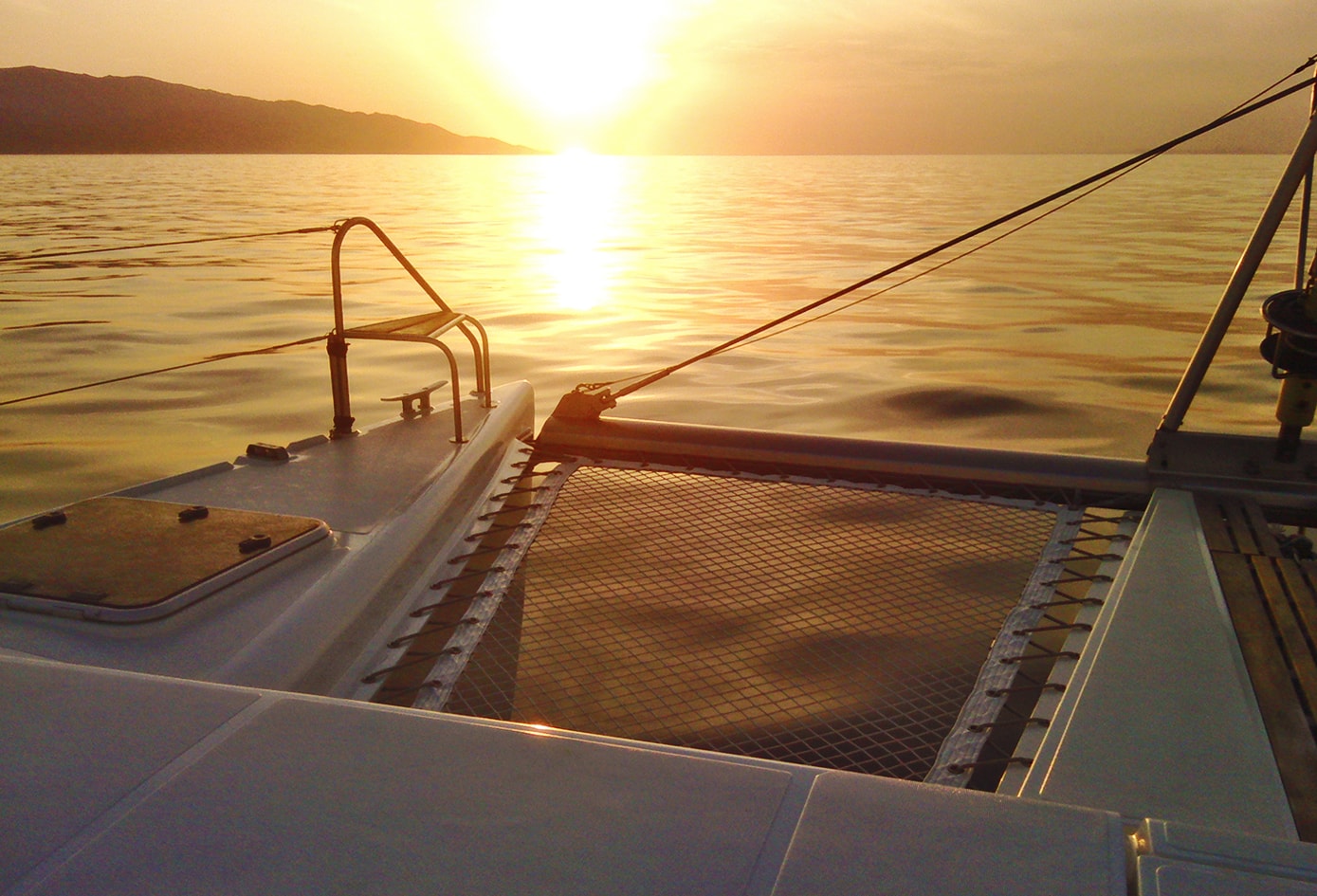 catamaran family sailing trip from Mykonos activities for families sunset tour Cyclades kids love greece