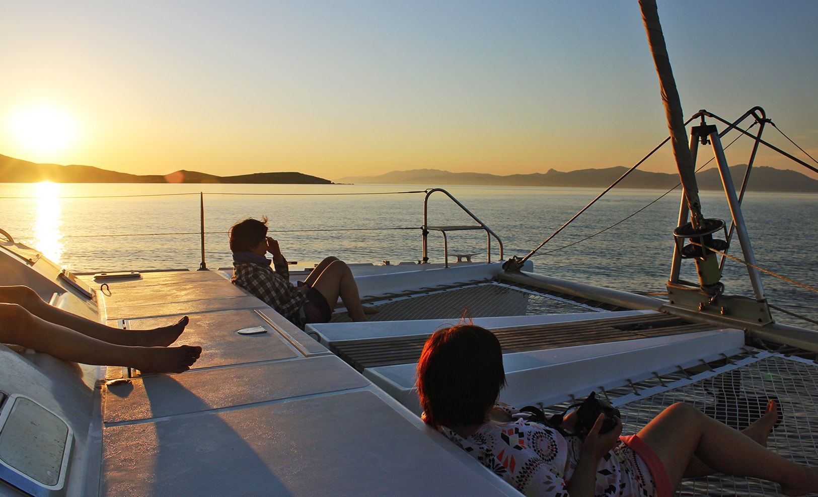 Cyclades kids love greece catamaran family sailing trip from Mykonos activities for families sunset tour