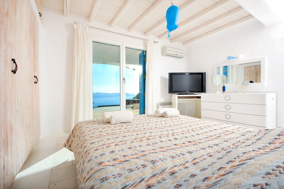 Agios Stefanos traditional village cosy family summer house in Mykonos island Cyclades kids love greece villas Delos view two