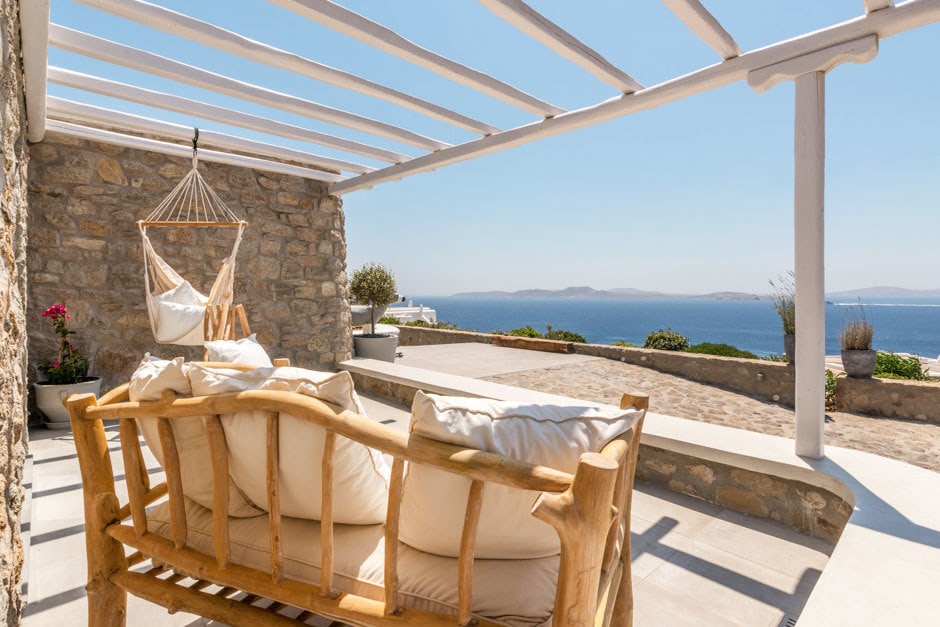 luxury bohemian family villa in Mykonos island accommodation for families Cyclades the Ioannou residence Agios Ioannis beach kids love greece